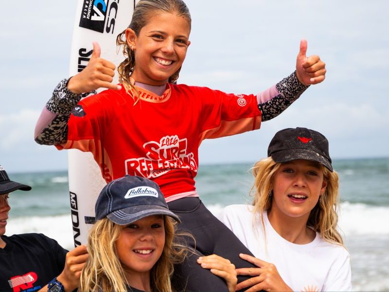 Junior surfers take on tough conditions at Rainbow Beach