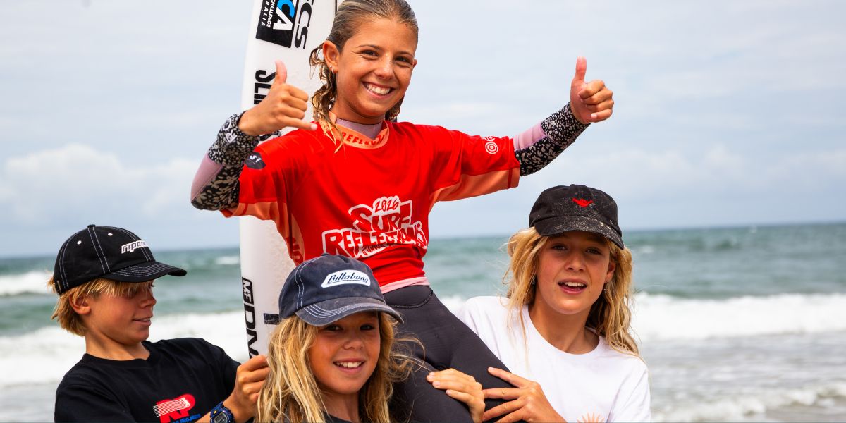 Junior surfers take on tough conditions at Rainbow Beach
